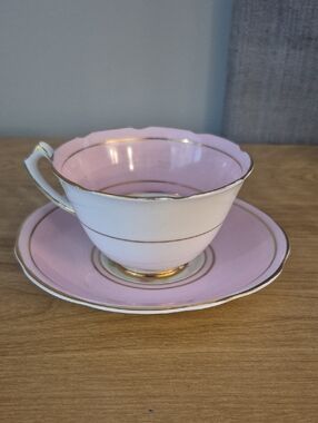 Pink and White Porcelain Teacup with Saucer and Gold Trim